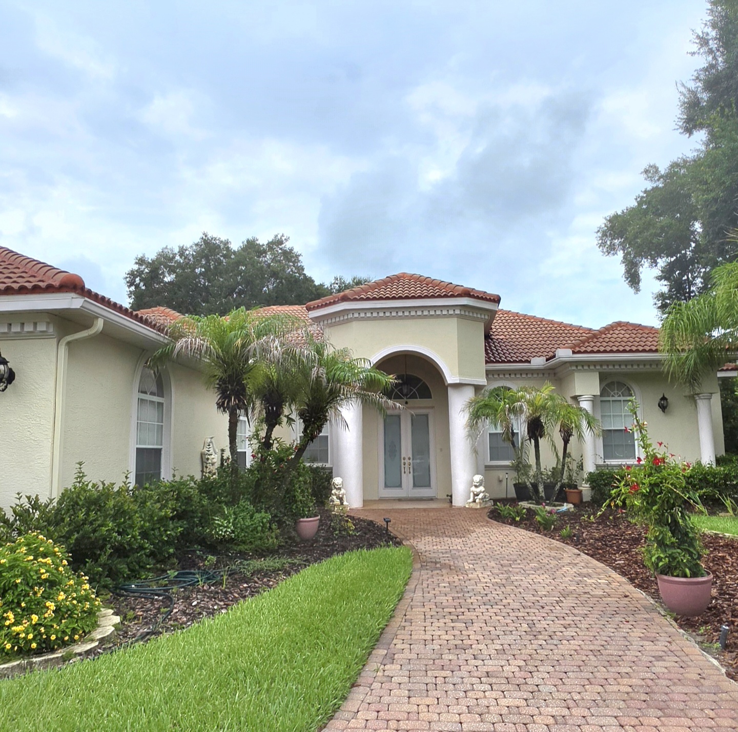 Lithia, FL Barrel Tile Roof Restored with Pressure Washing & Roof Cleaning